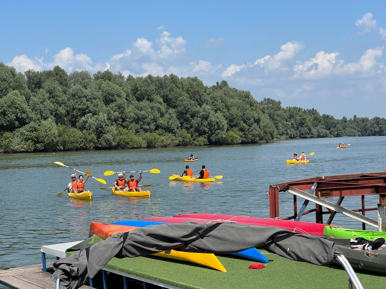 Hurricane Studio team kayaking on the river
